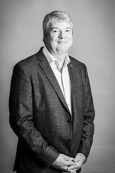 Portræt af Peter Hørlüch, partner og adm. direktør i KommPress